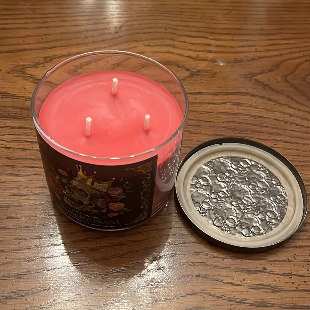 Bath & Body Works Vampire Blood candle and Wicked Vanilla Woods hand soap‎